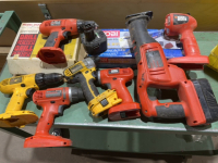 Miscellaneous crate of cordless tools, and one battery