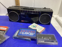 CASSETTE TAPES + PLAYER