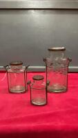 (3) DECORATVE JARS IN METAL HOLDERS