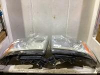 (2) FORD HEADLIGHTS 2009-14 F150