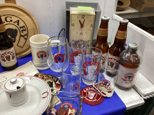 CALGARY BEER- BOTTLES,STEINS,CLOCK,WOOD TRAY