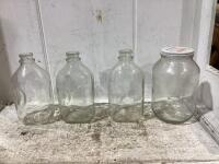 ANTIQUE MILK BOTTLES AND A JAR
