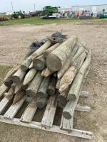 Lift of used fence posts, and some wire