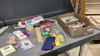 FLAT W/GLUE GUN +STICKS, CROSS STITCH PROJECT, DOWELS, TISSUE PAPER