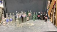 BOX W/ POP BOTTLES - PEPSI, U-UP, COKE, CRUSH, SHUN CREST, CALGARY