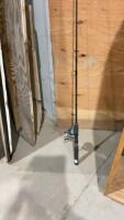 (2) FISHING RODS W/ REELS