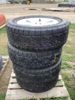 (4) BRIDGESTONE TIRES W/ 5-BOLT RIMS