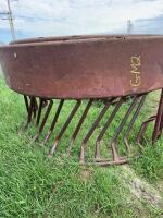 Two sections of round bale feeder