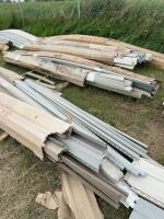 10 bundles of vinyl siding corners and track
