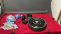 IROBOT ROOMBA VACUUM W/ EXTRA PARTS
