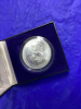 USA ONE OUNCE FINE SILVER. ONE DOLLAR COIN - 2