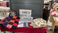 LARGE LIDDED TOTE W/ HANDMADE QUILT, (2) NEW VINTAGE FLANNEL BLANKETS, (2) SETS OF PILLOW CASES, AND RETRO PILLOWCASES + A QUILTING BOOK