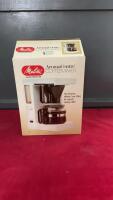 MELITTA COFFEE MAKER W/ SOME FILTERS AND MANUAL