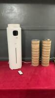 (2) SMALL ROLLS OF CUSHIONED WALL DECOR & KZF HUMIDIFIER W/ REMOTE