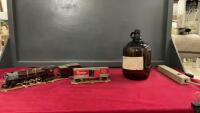 A VINTAGE ROOT BEER JUG & A BOX OF VINTAGE TRAIN PIECES W/ TRACKS