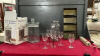 BOX W/ A SET OF 4 BREAD LOAF PANS, A JUICE JUG, ASSORTED WINE GLASSES, & A GLASS BELL JAR W/ LID