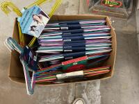 (35) PACKS OF COATED METAL HANGERS