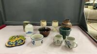 COLLECTION OF POTTERY ITEMS - CREAM AND SUGAR, SOME VASES, SMALL BOWLS, TRIVETS, ETC.