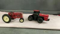 VINTAGE METAL FARMAL TRACTOR AND PLASTIC CASE TRACTOR