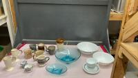 BOX W/ ASSORTED DISHWARE - CORELLE BOWLS, CUPS, AND SAUCERS, POTTERY MUGS, AND BLUE GLASSWARE