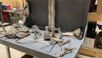 BOX W/ LEATHER SADDLE BAGS, BULL WHIP, STIRRUPS, CINCHES, HACKAMORES