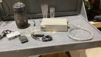 BOX W/ SMALL BUG ZAPPER, SONY 10 DISC MAGAZINE, FACE PLATE, REMOTE