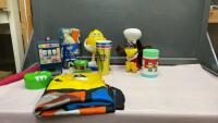 ASSORTMENT OF VINTAGE COLLECTIBLES - (2) M&M CANDY DISPENSER, (2) M&M&rsquo;S BLANKET + WATCH, COLLECTIBLE CANS AND CUPS, &ldquo;ROBINS DONUTS TIN CAN + COLLECTIBLE STUFFY