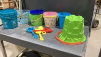 BOX FULL OF KIDS PLASTIC BUCKETS + SHOVELS