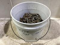 SHOP PAIL OF TRUCK TIRE CHAINS