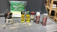 GREEN POLY TARP, SPRAY PAINT AND A PAINT SPRAYER