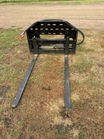 Skid steer adjustable fork