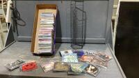 BOX OF ASSORTED CDS AND CD STAND