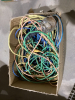 BOX OF ELECTRICAL CORDS