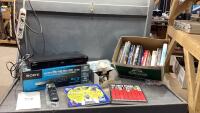 SONY BLU-RAY/DVD PLAYER + BOX OF ASSORTED BOOKS, PHONE CABLES
