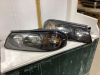 2 AUTO HEAD LIGHTS