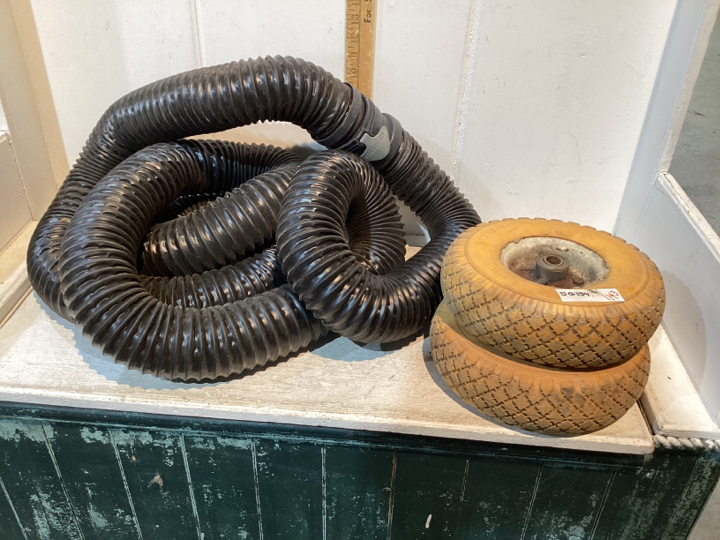 TWO SMALL TIRES RV DISCHARGE HOSE