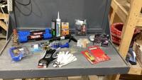 TUFF ROPE, BRAKE CONTROLLER, GLOVES, GORILLA GLUE, CAULKING GUN, SEALANT, FLASHLIGHT
