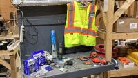 BOX W/MUFFLER CLAMPS, TAPE MEASURES, FLASHLIGHTS, HIGH VIS VEST