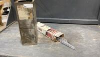 WELDING RODS IN METAL CONTAINER