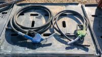 Two Diesel Hoses and Nozzles