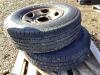 LT245/75R16 120/115S - (2) BRIDGESTONE V-STEEL LIGHT TRUCK TIRES W/ 8-BOLT RUSTED RIMS - 2