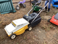 Yellow and White lawnmower electric