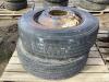 255/70R22.5 - (2) BRIDGESTONE TIRES W/ 10-BOLT RUSTED RIMS - 2