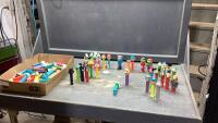 A GOOD ASSORTMENT OF PEZ DISPENSERS