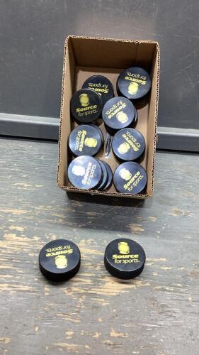 BOX WITH 17 HOCKEY PUCKS &ldquo;SOURCE FOR SPORTS&rdquo;