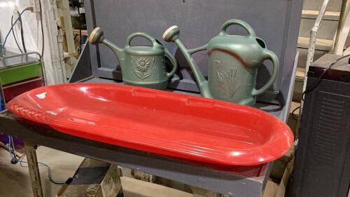PLASTIC SLED + (2) GARDEN WATERING CANS