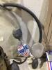 SHOP BOX OF MISCELLANECOUS W/ SAFETY GLASSES, BATTERY TESTER, OIL WRENCH, ANGLE GRINDER GUARDS & METAL WIRE - 3
