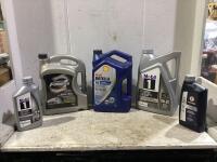 SHOP BOX OF MIXED ENGINE OILS