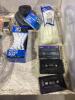 TOTE OF MISCELLANEOUS ELETRONICS W/ CABLES, CASSETTES, REMOTE, BRUSHED & AC ADAPTER - 6