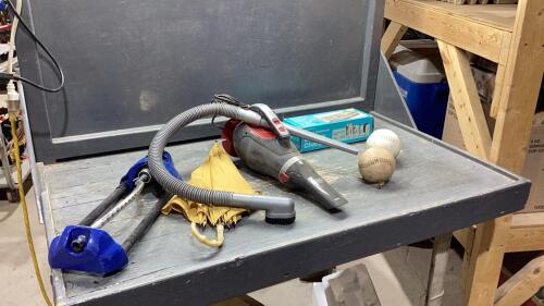 YELLOW CRATE W/SPRINKLER, BATTERY CHARGER, B+D DUST BUSTER, SOFT BALLS